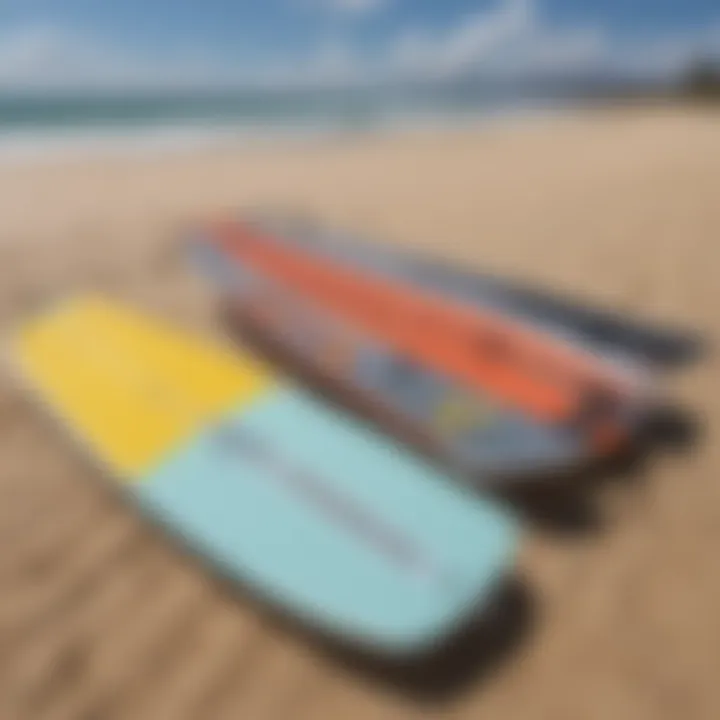 Comparison of traditional kitesurf board and foil board on a beach