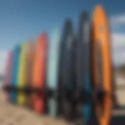 A selection of summer wetsuits displayed on a rack