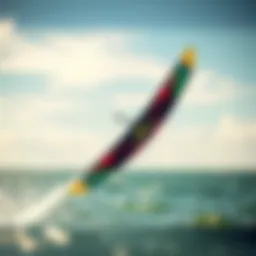 Dynamic action shot of Cabrinha Switchblade in flight over water