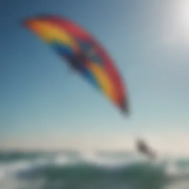 Kite in the Sky A vibrant kite soaring high above the ocean waves, showcasing the thrill of kiteboarding.