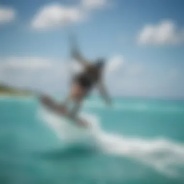 A kiteboarder gliding over the turquoise waters of Cat Island