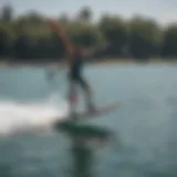 A hydrofoil windsurf board gliding effortlessly above the water.