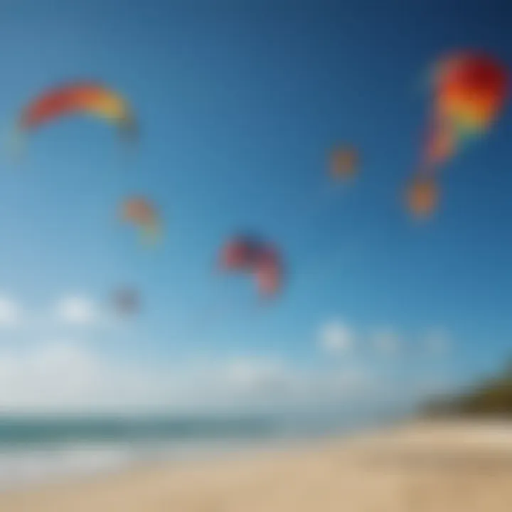 Colorful kites soaring in the clear blue skies above Kite Beach