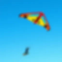 Vibrant Slingshot kite soaring against a clear blue sky