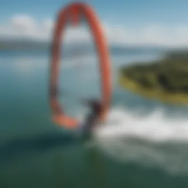 An aerial view of a kiteboarder on a lake, highlighting the hydrofoil's effectiveness