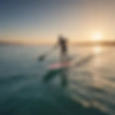 An aerial view of a foil stand up paddle board gliding effortlessly over calm waters