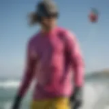 A vibrant long sleeve wet shirt designed for kiteboarding