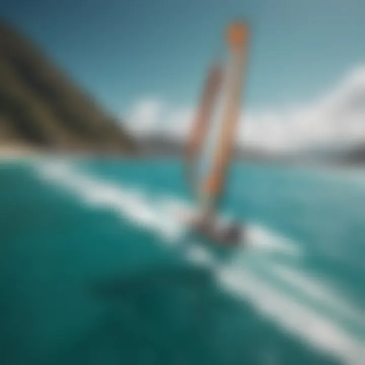 A breathtaking view of a wing sailor gliding across turquoise waters