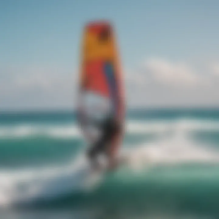 Colorful kiteboarding equipment displayed against a backdrop of ocean waves