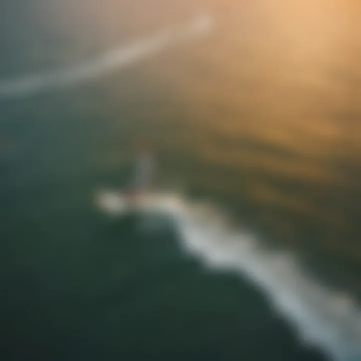 Aerial view of kite surfing at sunset