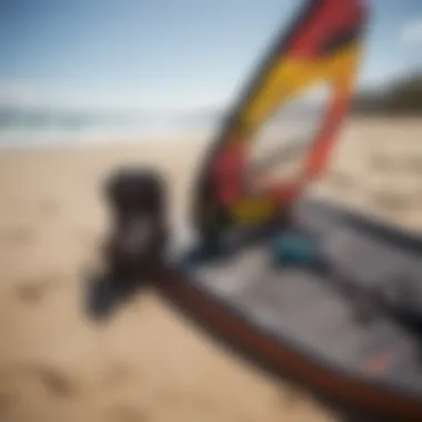 Kitesurfing equipment laid out on the beach