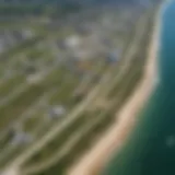 Aerial view of Montauk Airport showcasing its runway and surrounding landscape.