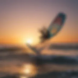 A kiteboarder gliding over a serene ocean at sunset