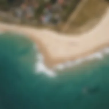 An aerial view of a kiteboarding beach with kite surfers in action