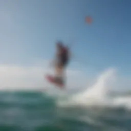 Kiteboarder demonstrating the use of a safety leash while riding waves